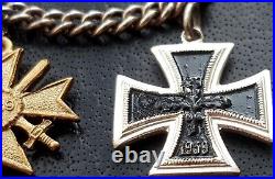 10739? German post WW2 1957 pattern miniature chain Iron Cross Wound Badge