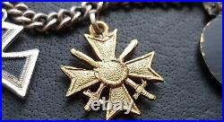 10739? German post WW2 1957 pattern miniature chain Iron Cross Wound Badge