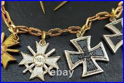 10740? German post WW2 1957 pattern miniature chain Iron Cross War Merit Cross