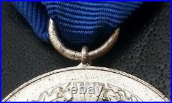 10751? German army post WW2 1957 pattern Long Service Award 4 Years Medal
