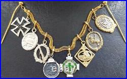 10837? German post WW2 1957 pattern miniature chain Iron Cross Wound Badge