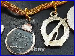 10837? German post WW2 1957 pattern miniature chain Iron Cross Wound Badge