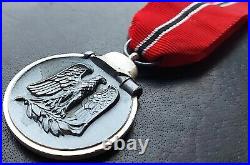 11027? German post WW2 1957 pattern Eastern Front Winterwar Medal Ostmedaille
