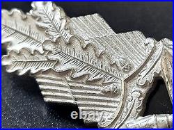 11558? German post WW2 1957 pattern Close Combat Clasp badge Nahkampfspange
