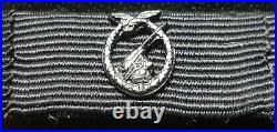 7383? German post WW2 1957 pattern ribbon bar Iron Cross Luftwaffe Flak Badge