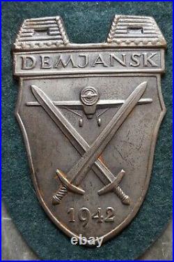 8413? German army Wehrmacht post WW2 1957 pattern DEMJANSK shield 1942 ST&L