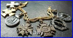 8775? German post WW2 1957 pattern miniature chain Wound Badge Eastern Front