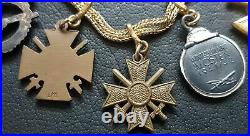8775? German post WW2 1957 pattern miniature chain Wound Badge Eastern Front