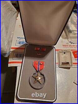 Bronze star medal valor cluster named In box