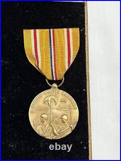 Framed WW2 Named American Navy Medals
