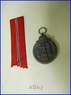 German WW2 Grouping Original Ostfront Medal with Assoc. Rare German Lang. Book