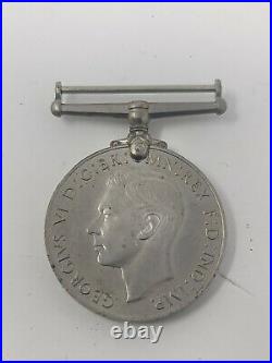 Medal- WW2 THE DEFENCE MEDAL GEORGIVS VI D, G. BR OMN. REX FDINDIMP WW2