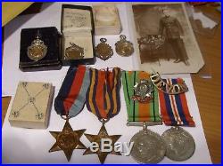 Medals WW2 and associated items Devon Regt Selley from Alphington Silver fobs