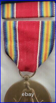 VINTAGE UNITED STATES WORLD WAR II CAMPAIGN AND SERVICES VICTORY MEDAL With RIBBON