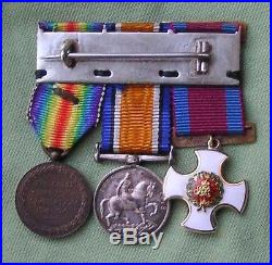 WW1. BRITISH MINIATURE MEDAL GROUP OF 3. (D. S. O. 18ct. GOLD) WAR / VICTORY (MID)