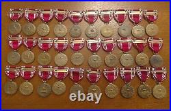 WW2 30 US Army NAMED Good Conduct Medals. YES, THIRTY DIFFERENT NAMED MEDALS