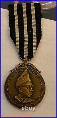WW2 Burma Medal Group to Major with very rare Pingat Jasa Kebaktian Medal