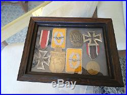 WW2 German Iron Cross 1st and 2nd class, shield, tabs, medal, and sports badge