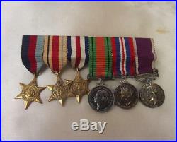 WW2 Medal Set Plus Badges, Photographs Etc- W. O. II (C. S. M) M. W. F. Pettet Roy