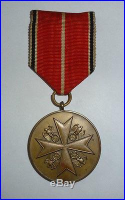 WW2 Order of German Eagle bronze medal. Ring marked 29
