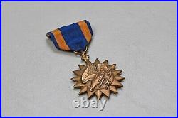 WWII U. S. ARMY AIR CORPS AIR MEDAL withWRAP BROACH NUMBERED