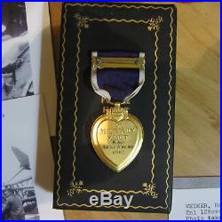 WW II PURPLE HEART MEDAL WITH Oringinal Document and more medals
